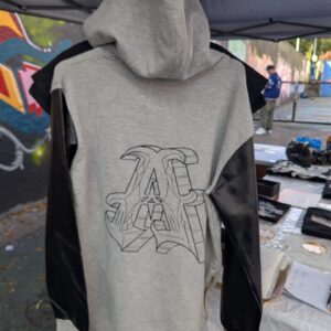 Grey original hoodie with faux leather sleeves.